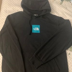 Men’s black hooded Northface sweatshirt.